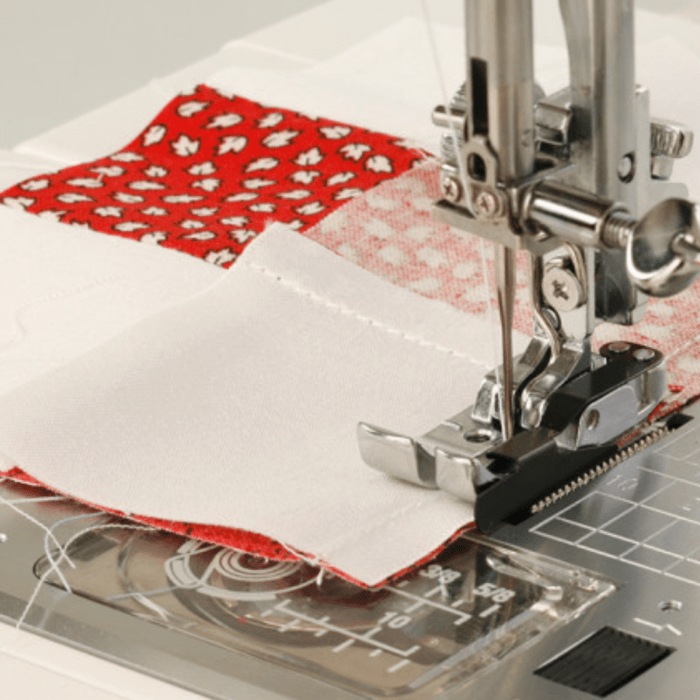 Janome - Pied 1/4 d'inch avec guide bord droit